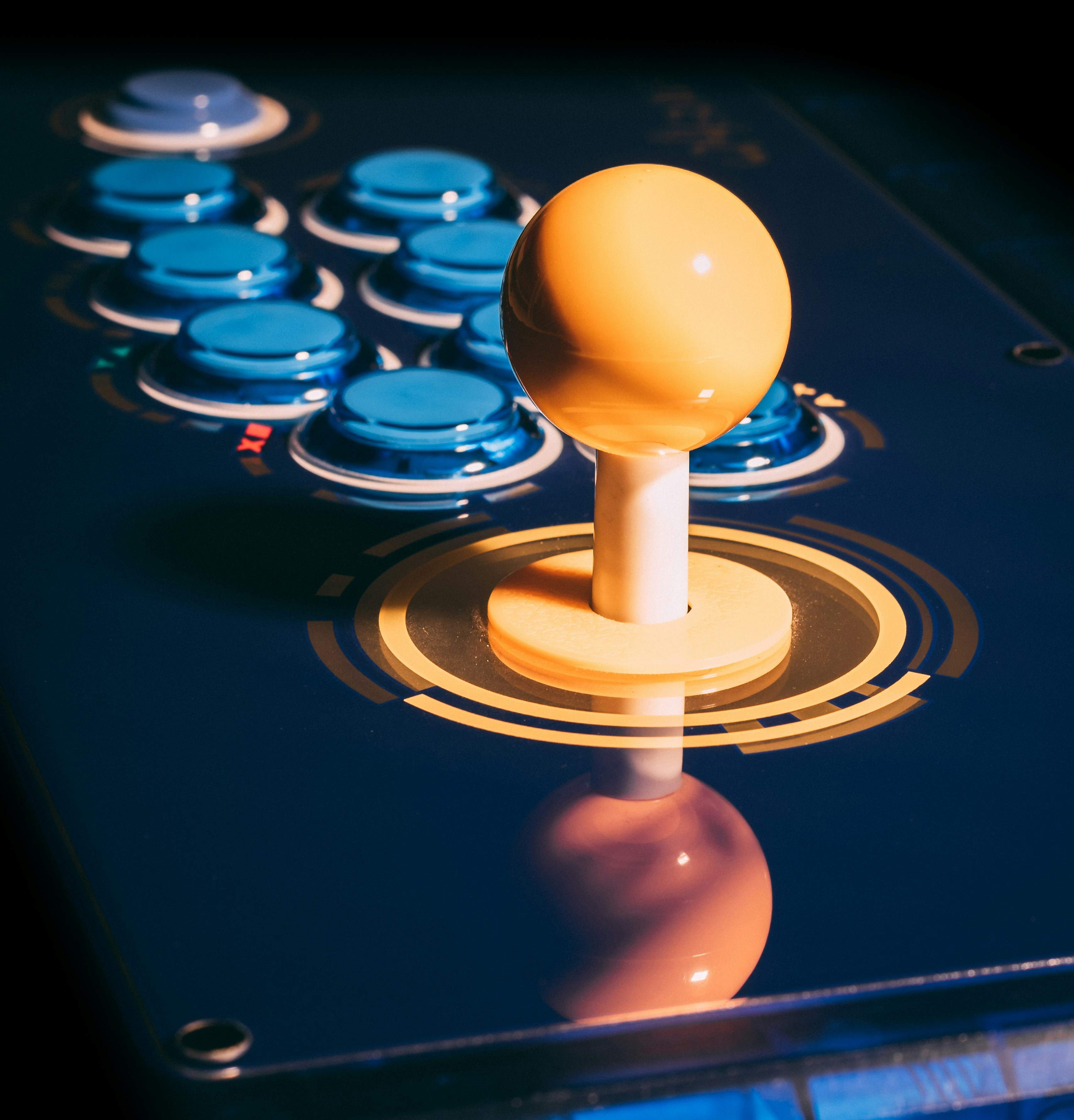 Close-up of an arcade fight stick controller in the MODE play zone